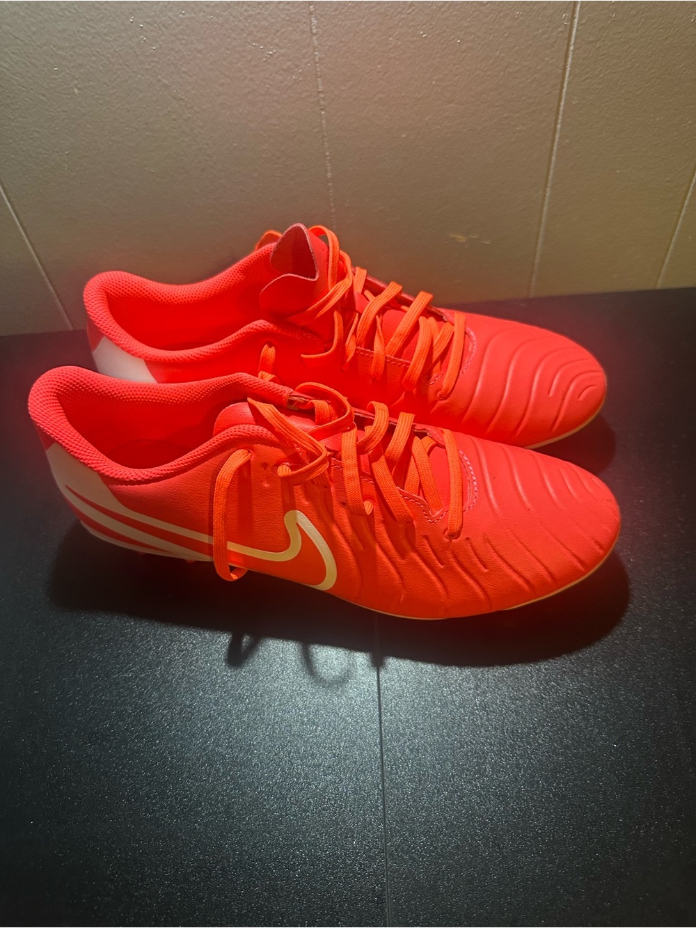 Nike mens Soccer Cleats in Vibrant Coral-Orange with White Swoosh - Picture 3 of 6